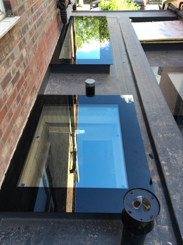Multiple flat roof skylights on extension in West Kensington